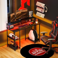 HOMCOM Computer Desk with Power Outlets and LED Lights, 120 x 50cm Reversible Home Office Desk with Monitor Stand and 2-Tier Storage Shelves, PC Table with Cable Management, Carbon Fibre Grey